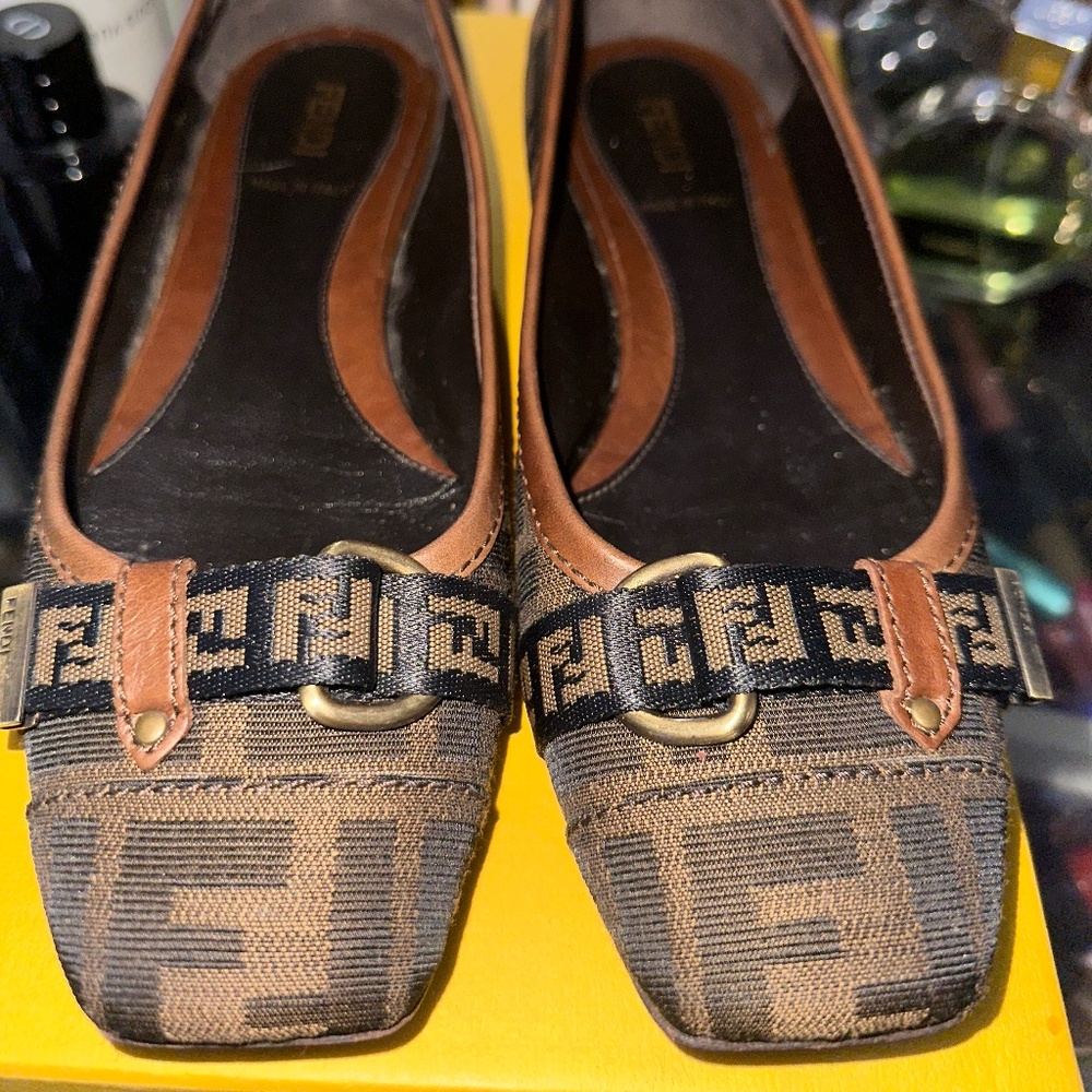 Fendi slip flats.